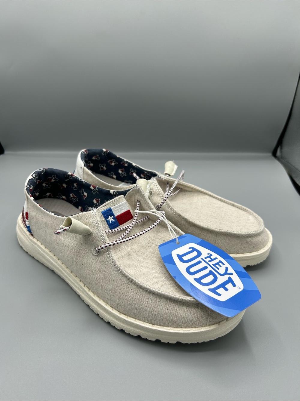 Hey Dude Beige Canvas Slip-On Loafers with Texas Flag Detail